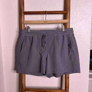 Gray athletic shorts with pockets
